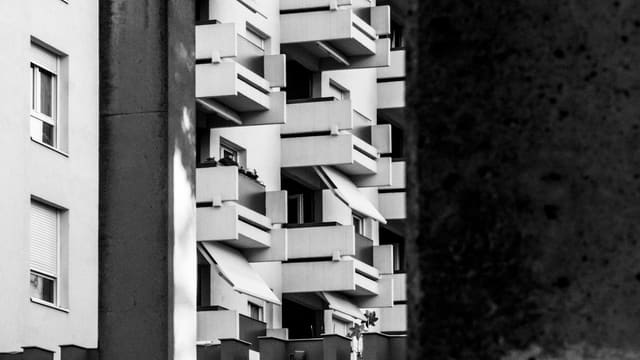 grayscale photo of wooden blocks