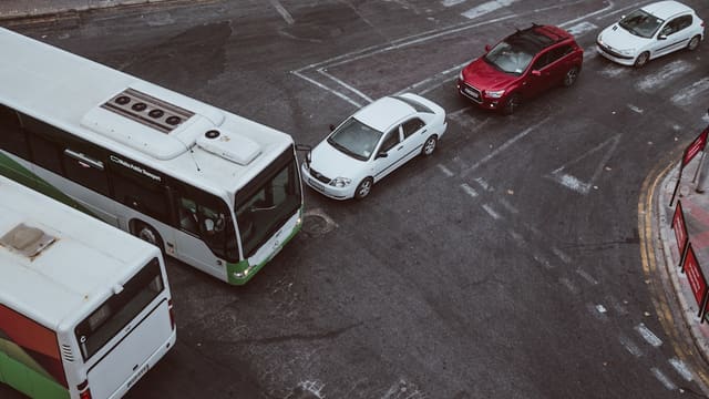 two bus and three cars