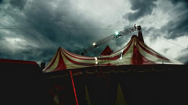 Circus tent under a stormy sky